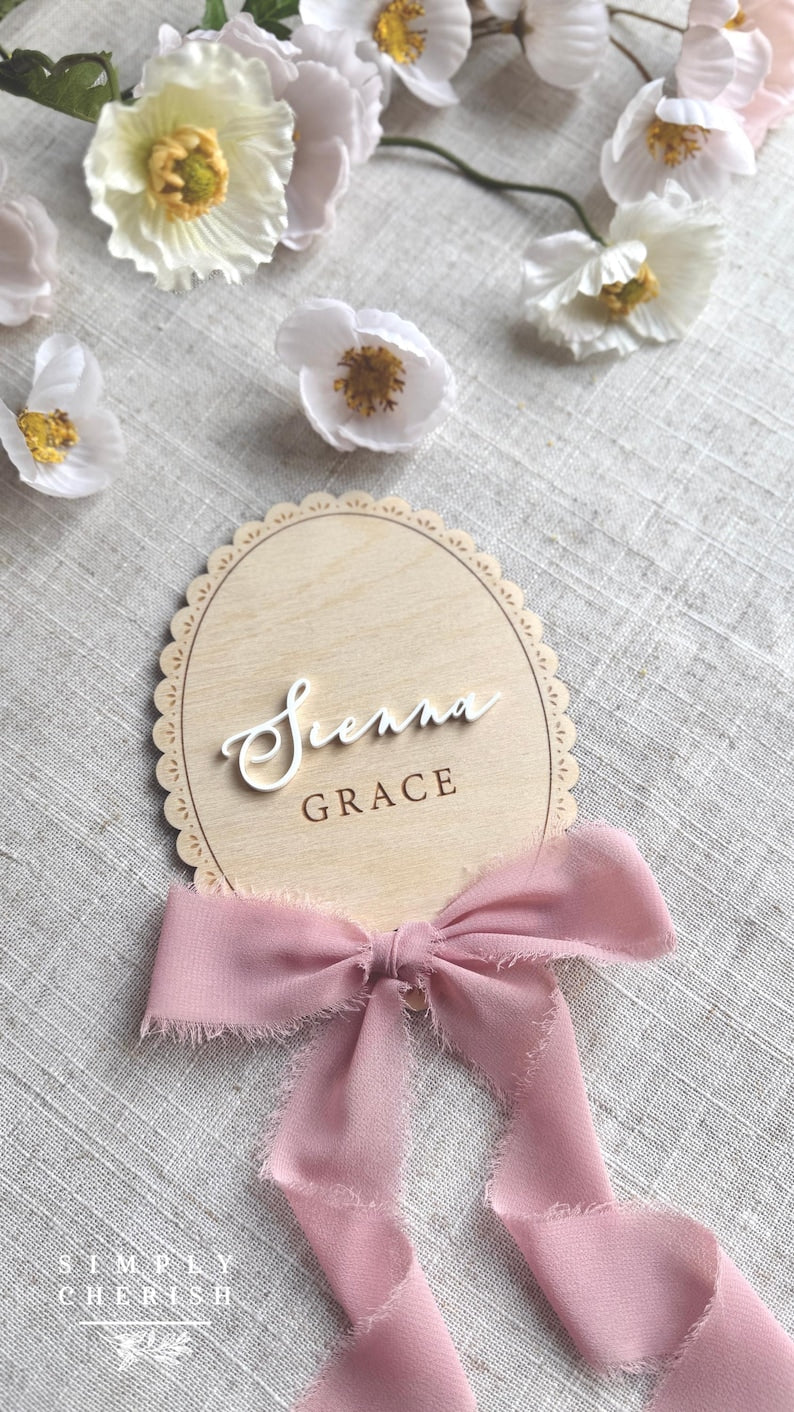 Lace-trimmed sign with raised white Sienna script and engraved GRACE
