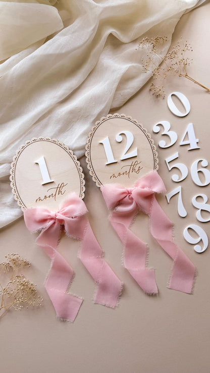 Lace-Trimmed Monthly Milestone Signs